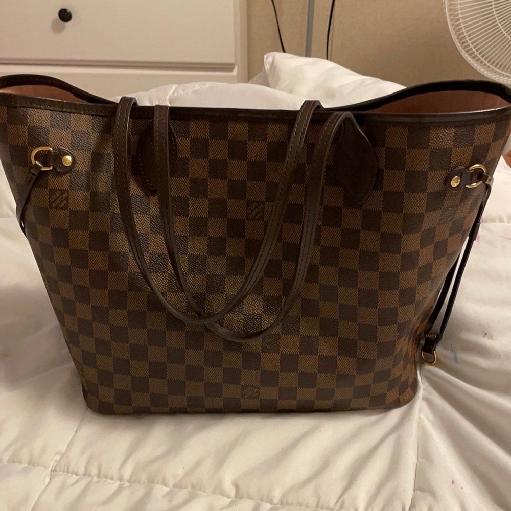 Great condition on outside. Stains in interior from hair product.
